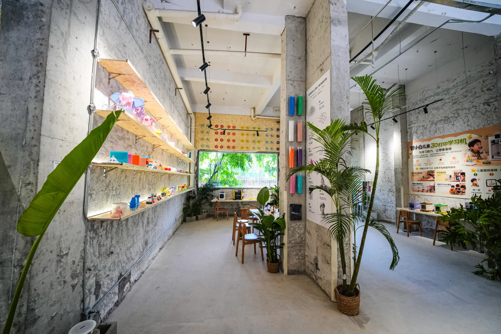 Colour samples and printed objects along the gallery
