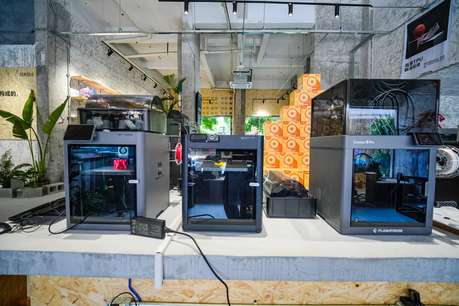 Close-up of printers and colourful printed objects